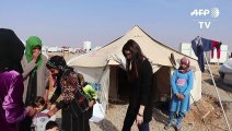 Irak: une coiffeuse rend leur féminité aux déplacées de Mossoul