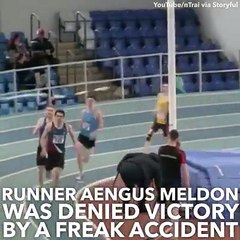 A runner was denied victory by a freak accident.