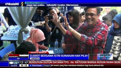 Djarot Nyoblos dengan Menggunakan Baju Kotak-kotak