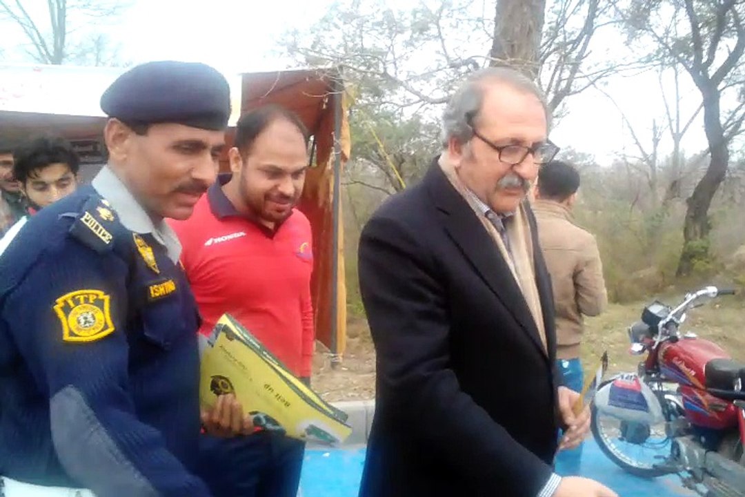 Islamabad traffic police com pains for awareness fowling traffic rolls for motorcyclist . Report by PCCNN Chaudhry Ilyas Sikandar​ Dated 15, february 2017