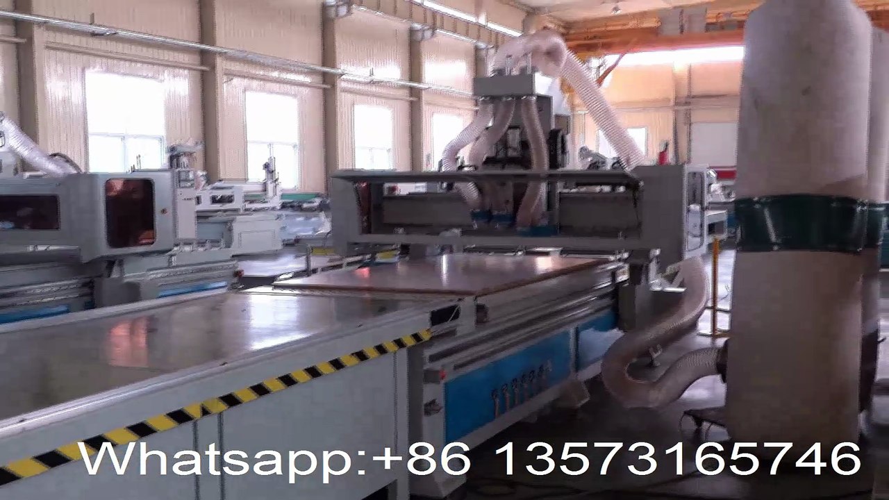 Loading CNC woodworking center