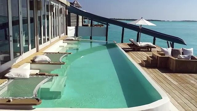 Un hôtel de luxe installe des toboggans qui relient les chambres directement à l'océan