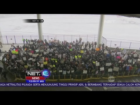 Warga Amerika Gelar Unjuk Rasa Protes Kebijakan Presiden Donald Trump - NET 12