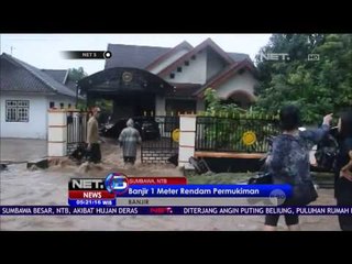 Descargar video: Tanggul Sungai Besuki Jebol, Banjir Rendam Rumah Warga di Situbondo Jawa Timur - NET5