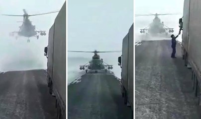 Russian Military Helicopter Lands To Ask Truckers For Directions