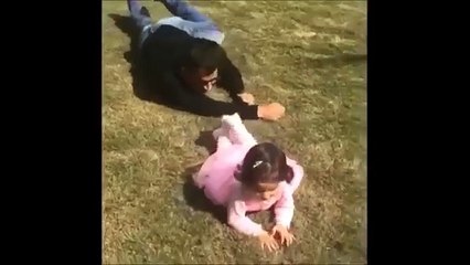 M S Dhoni is playing with his daughter Ziva