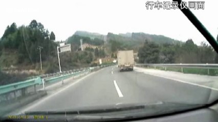 Dashcam films flying planks hit car