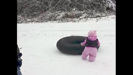 This baby is trying to figure out the sled. But the helper steps in and has the internet in laughter!