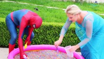 Frozen Elsa & Spiderman Buried Head in Orbeez sand surprise vs Joker Pranks Fun Superhero Real Life--Nwprb-JQ