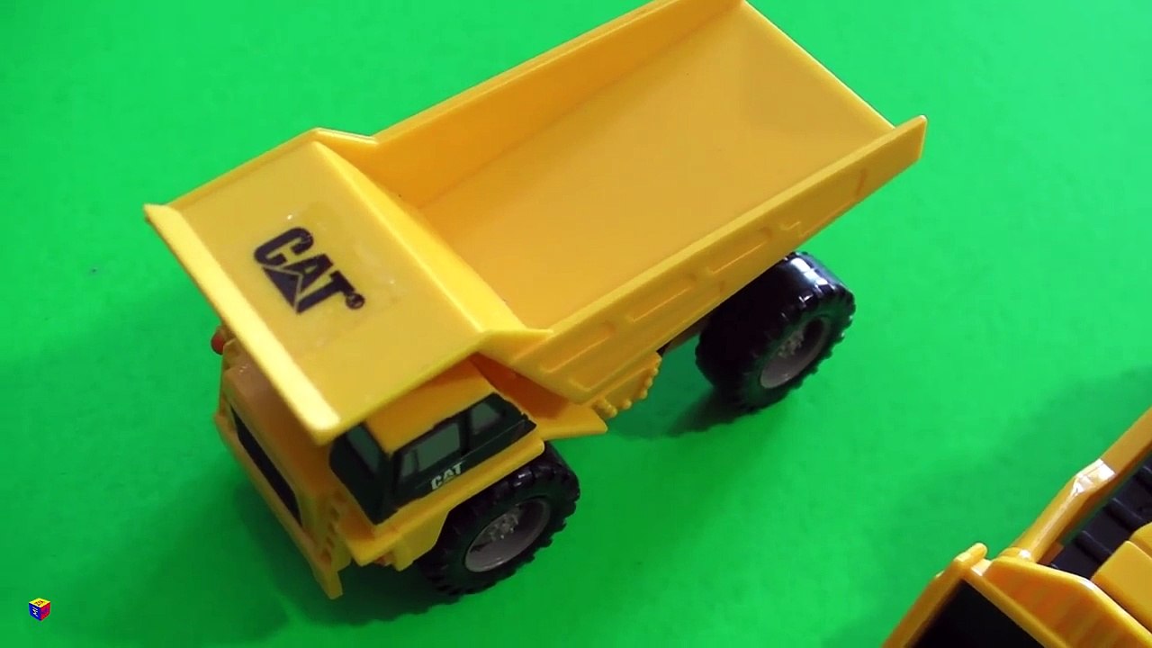 Trucks for children kids. Toy construction trucks. Sensory activity for toddlers - rainbow rice.-AMZym