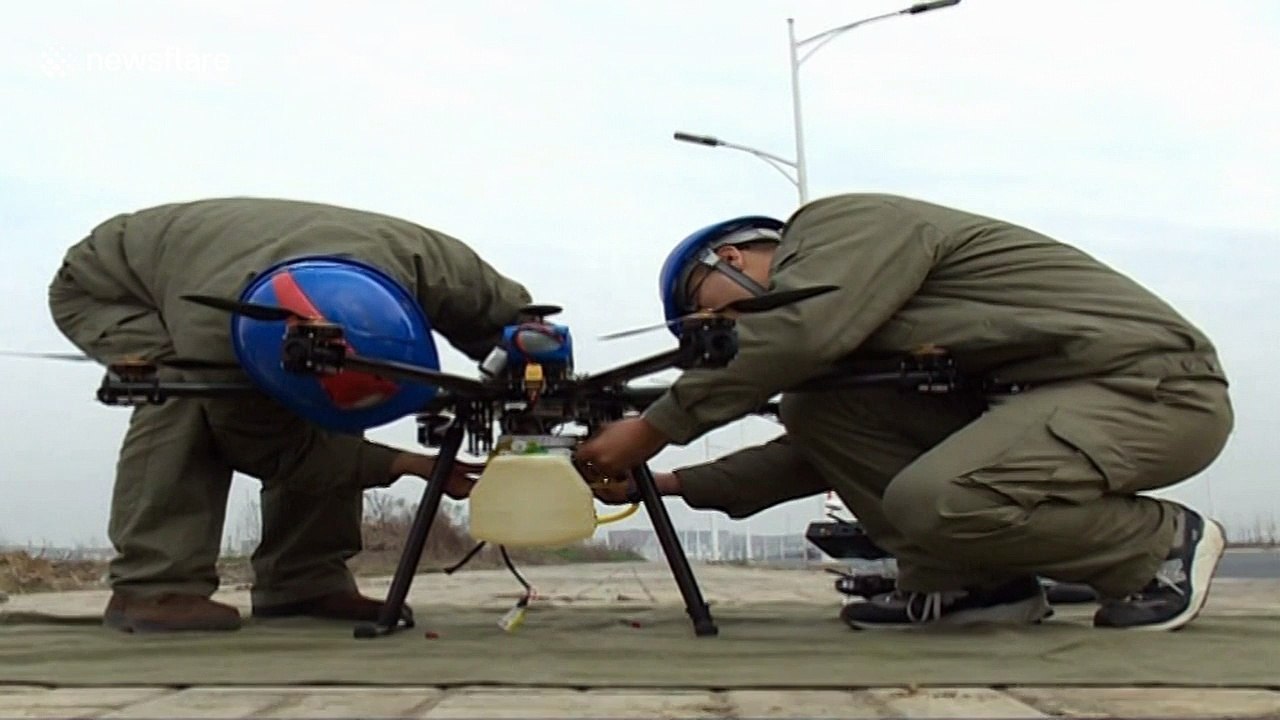 Chinese power company uses flame-spewing drone to burn rubbish off high-voltage wires