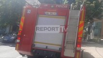 Report TV - Tiranë, përfshihet nga flakët një pallat pranë Drejtorisë së Policisë