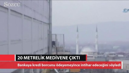 Kredi borcunu ödeyemeyince 20 metrelik yangın merdivenine çıktı