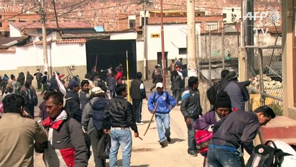 Bolivian coca farmers clash with police over output curb