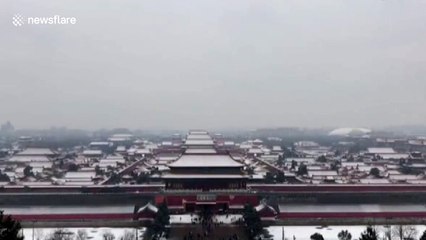 First snow of the year in Beijing covers the Forbidden City