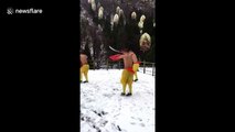 Shaolin Monks filmed practising kung-fu in the snow