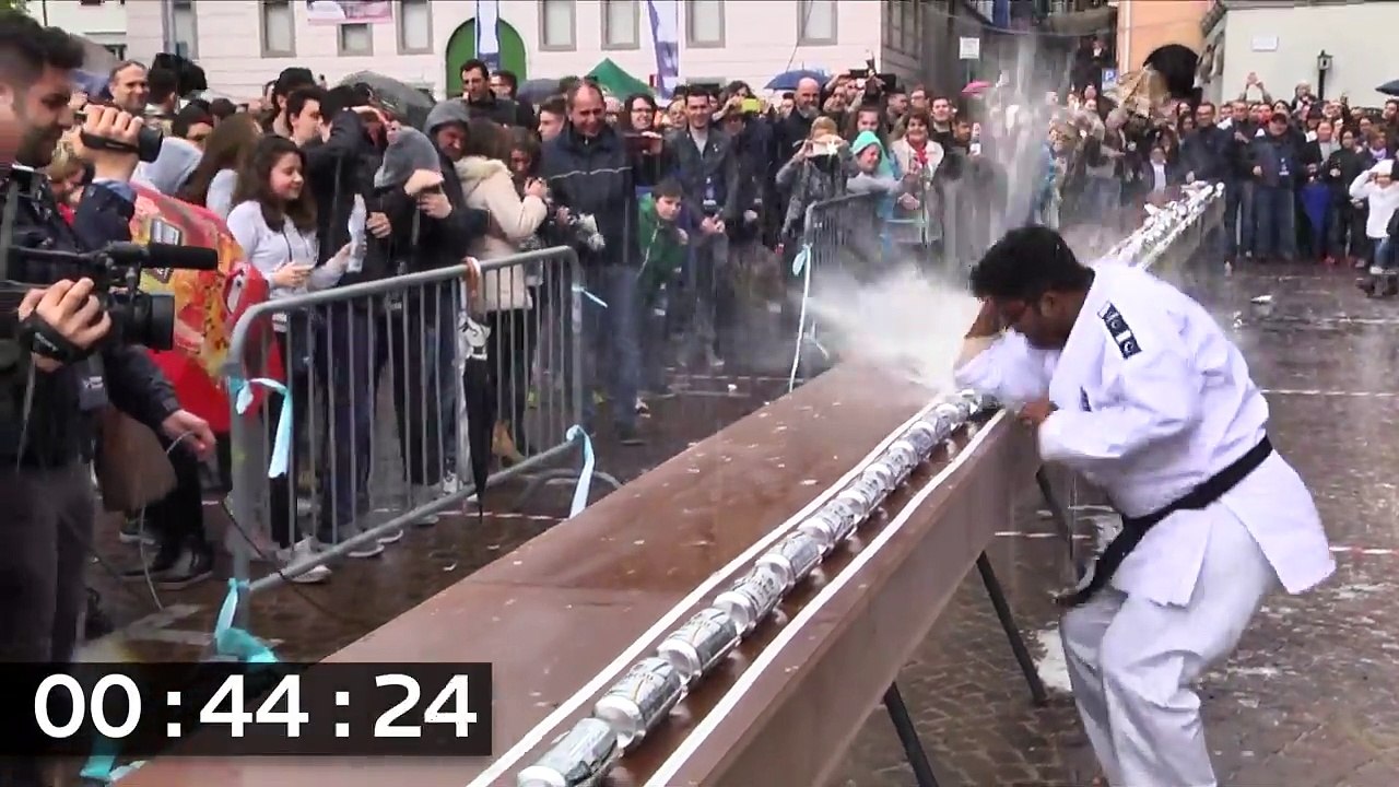 Most drinks cans crushed with the elbow in one minute - Guinness World Records