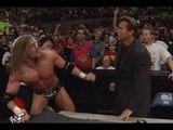 Arnold Schwarzenegger  punches Triple H