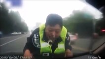 Un chauffard chinois bourré traine un policer sur le capot sur plus d'un kilomètre