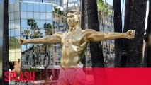 the story behind the Giant Kanye West Oscar Statue