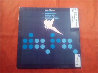 LOST WITNESS.(7 COLOURS.(MOGUAIL VOCAL MIX.)(12''.)(2001.)