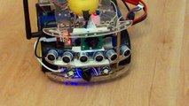 Arduino robot car testing Ultra Sonic Sensors. Arduino,Raspberry Pi,Camera,Lithium battery,WIFI