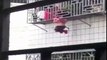 Two Men Saved a Little Girl Hanging From Fourth Storey Window of a ResidentialBbuilding Tuesday in the City of Meizhou,