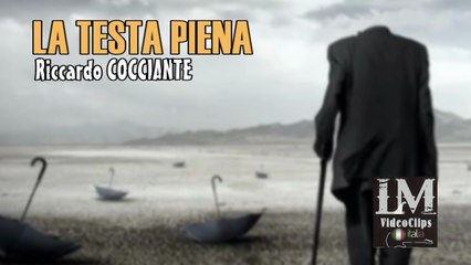 LA TESTA PIENA   (Riccardo Cocciante)