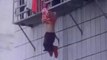 Two Men Save Girl Hanging by Neck From Fourth Storey Window