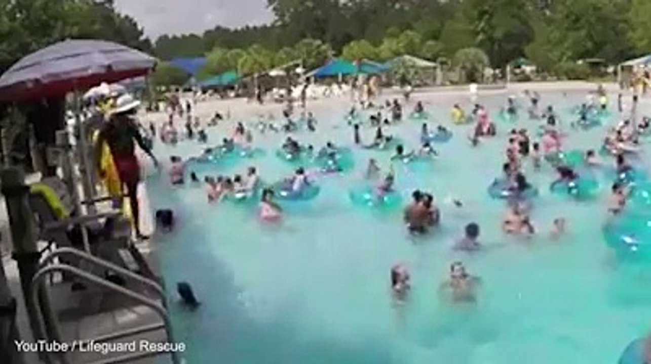 Heroic lifeguard saves drowning girl in swimming pool