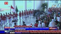 Hujan Deras, Jokowi Berbagi Payung dengan Raja Salman