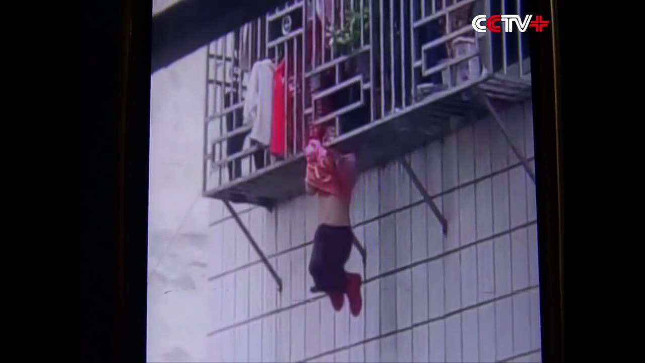 Two Men Save Girl Hanging by Neck From Fourth Story Window