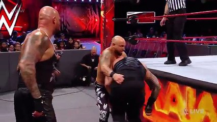 Roman_Reigns_vs._Luke_Gallows___Karl_Anderson_-_2-on-1_Handicap_Match