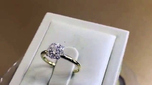 Diamond ring like a solitaire in 18 carats yellow gold