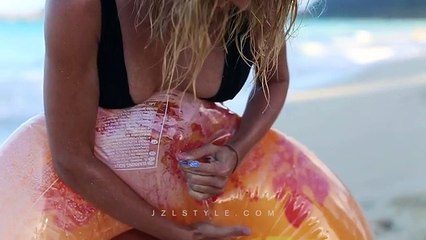 Sara J Underwood in the beach in bikini