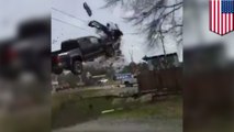 Epic truck crash: escaped convict fleeing from cops goes off road and airborne in truck