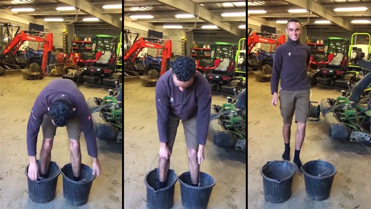 Régis essaye de soulever son corps à l'aide de seaux