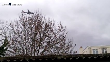 Black UFO Flying Over Airport London, Mar 26, 2016