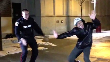 Fun-Spirited Officer Break Dances With Students