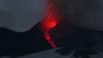 Lava spurts into the sky as Mount Etna erupts