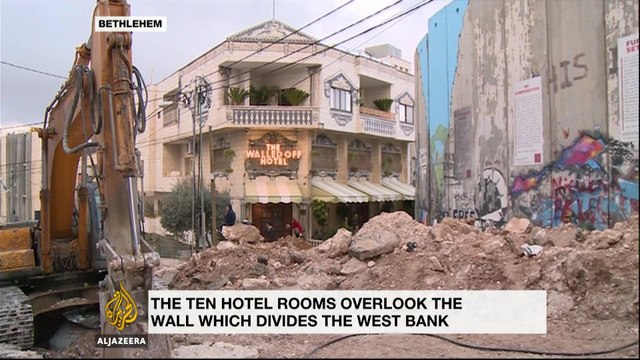 Banksy opens Walled Off Hotel in Bethlehem