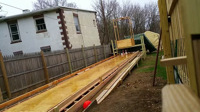 He builds a bowling alley in the garden. The way that raises the pins is brilliant!