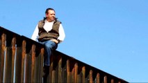 Mexican politician seen in video atop US border fence