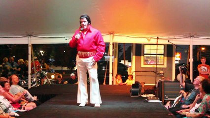 Mike Adams gives his Elvis Presley scarf to it's original owner David Whitaker EW 2014