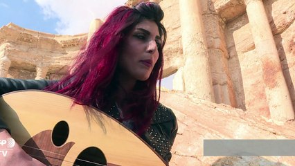 موسيقيون سوريون يغنون للعودة بين اثار مدمرة على مسرح مدينة تدمر