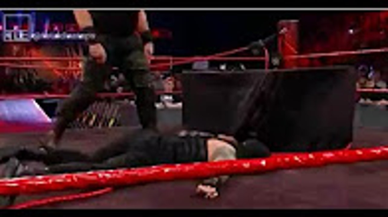 Roman Reigns breaks the ropes of the ring - Roman reigns vs Braun Strowman WWE Raw 27 February 2017