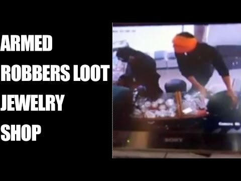 Allahabad jewellery shop looted , caught on camera : Watch video | Oneindia News