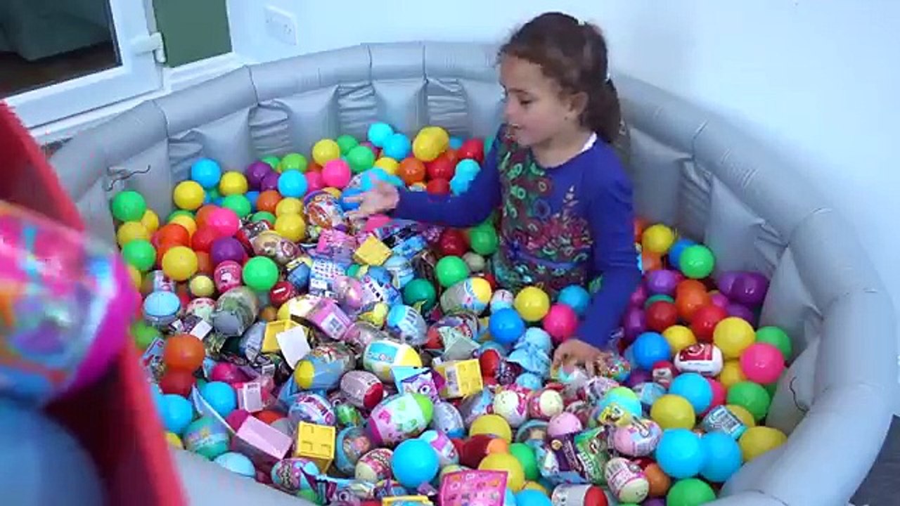 Surprise Eggs Giant Pool full of Kinder Surprise Toys Disney Eggs Mashems Fashems and Shopkins