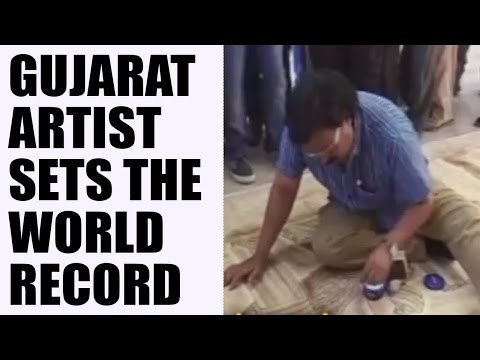 Gujarat artist makes the longest painting with fire: Watch video | Oneindia News