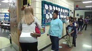 3rd grade teacher doing personalized handshakes